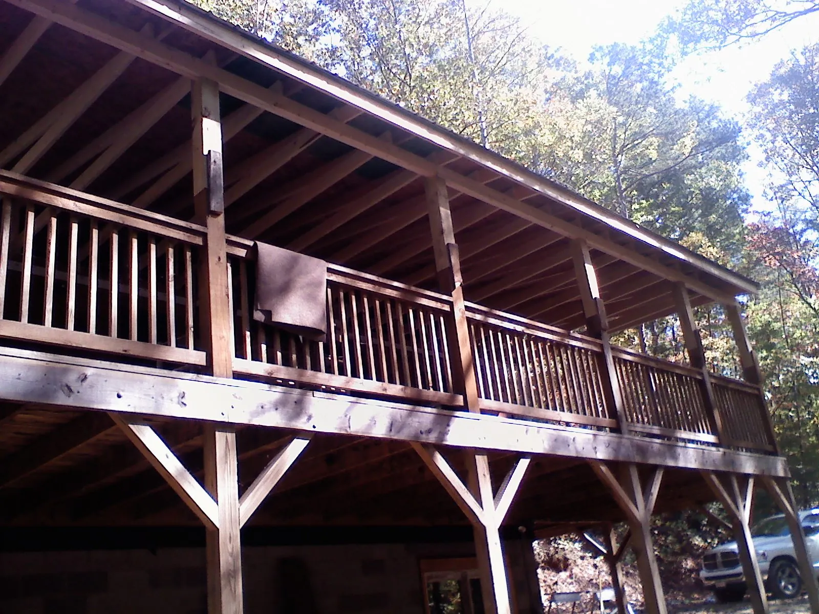 Timber framing under a new elevated porch and deck — Roof Leak Repair in Arlee by Roofing Brothers
